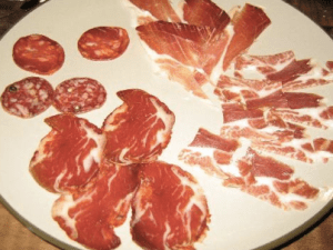 A tasting of jamón at La Oliva in Granada: Ibérico, serrano, lomo, chorizo, and salchichon.
